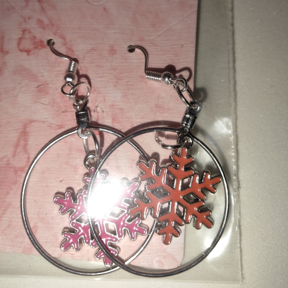 Red snowflakes inside of a sterling silver hoop